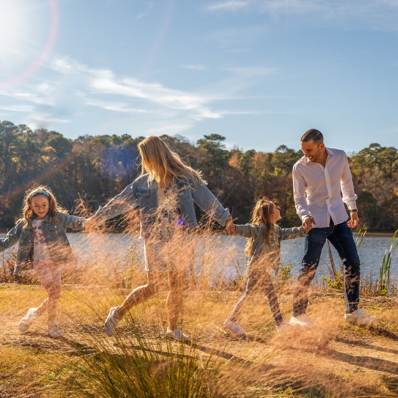 The Sedighravesh family by a lake in North Carolina